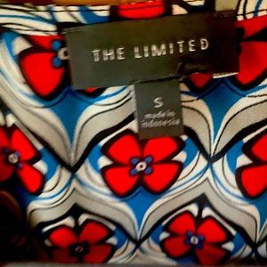 Bright yet professional shell top.